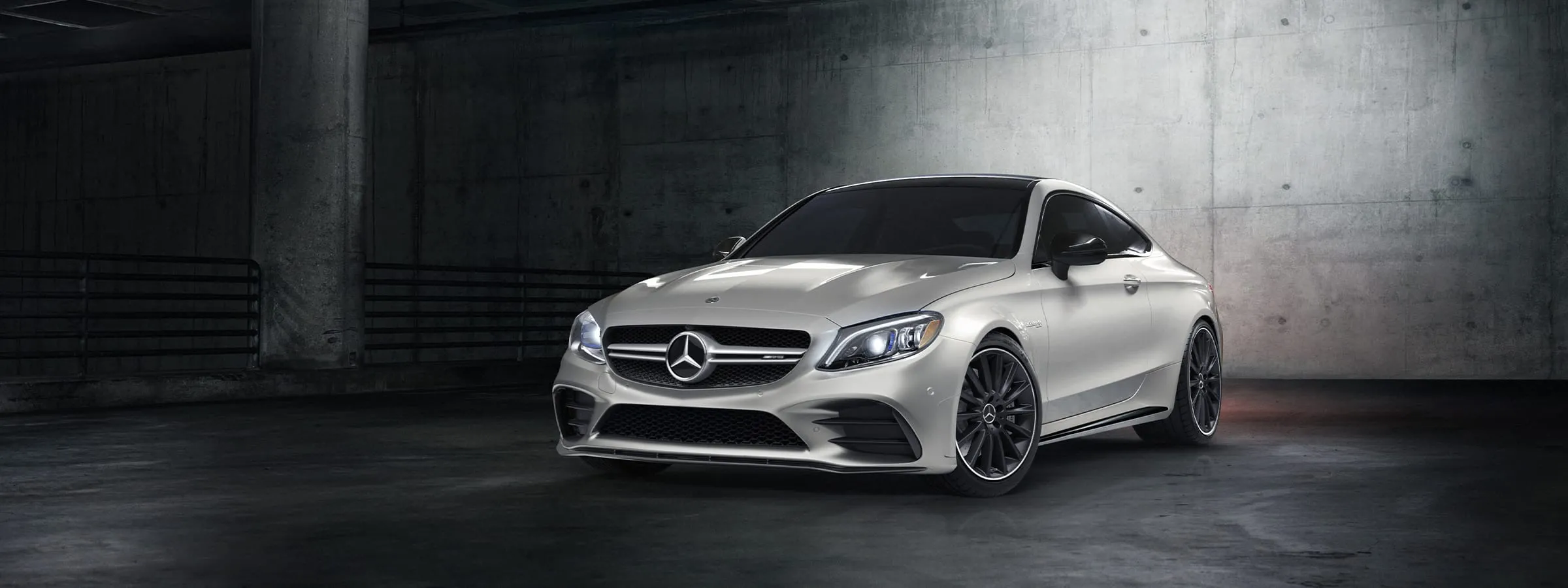 https://www.mbusa.com/content/dam/mb-nafta/us/myco/my23/c/coupe/class-page/amg/2023-AMG-C-COUPE-HERO-DR.jpg