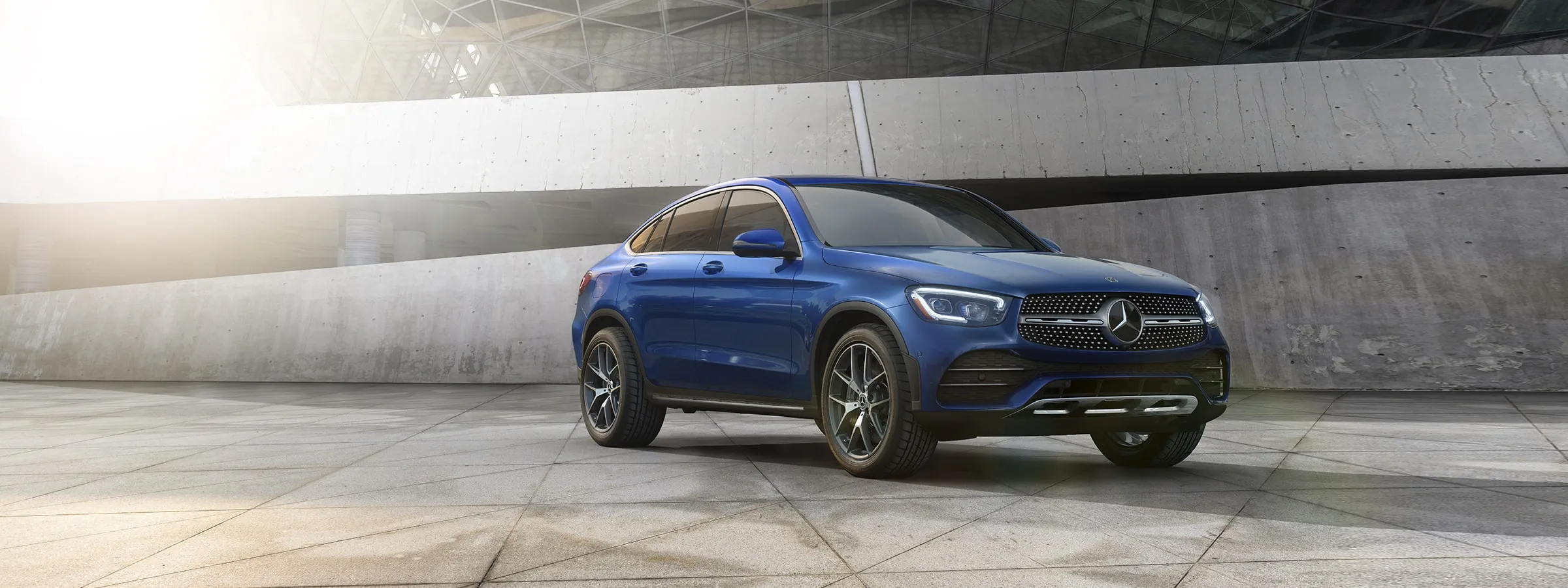 https://www.mbusa.com/content/dam/mb-nafta/us/myco/my23/glc/coupe/class-page/series/2023-GLC-COUPE-HERO-DR.jpg