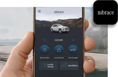 The Mercedes me app is shown on a phone with a customer’s vehicle info on display.